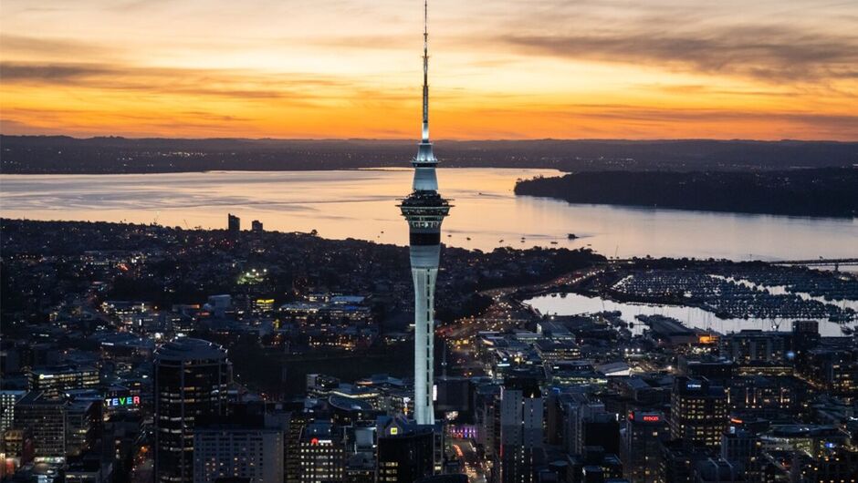 Sunset over the Skytower and Auckland