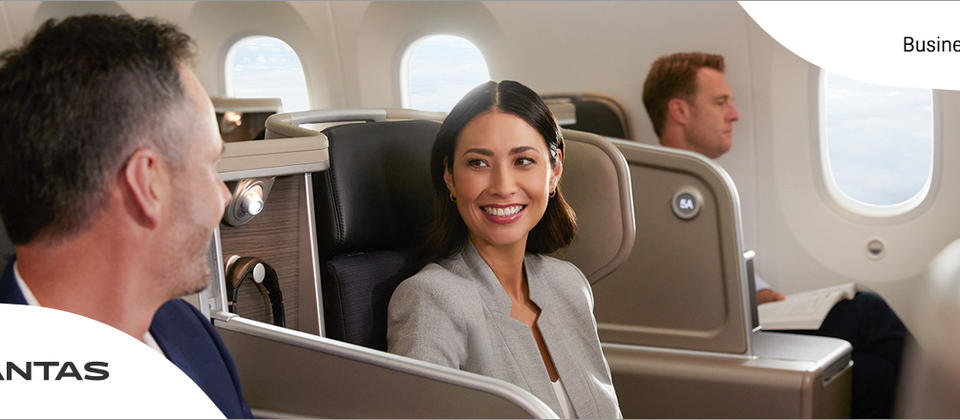 qantas 787 business couple chatting border